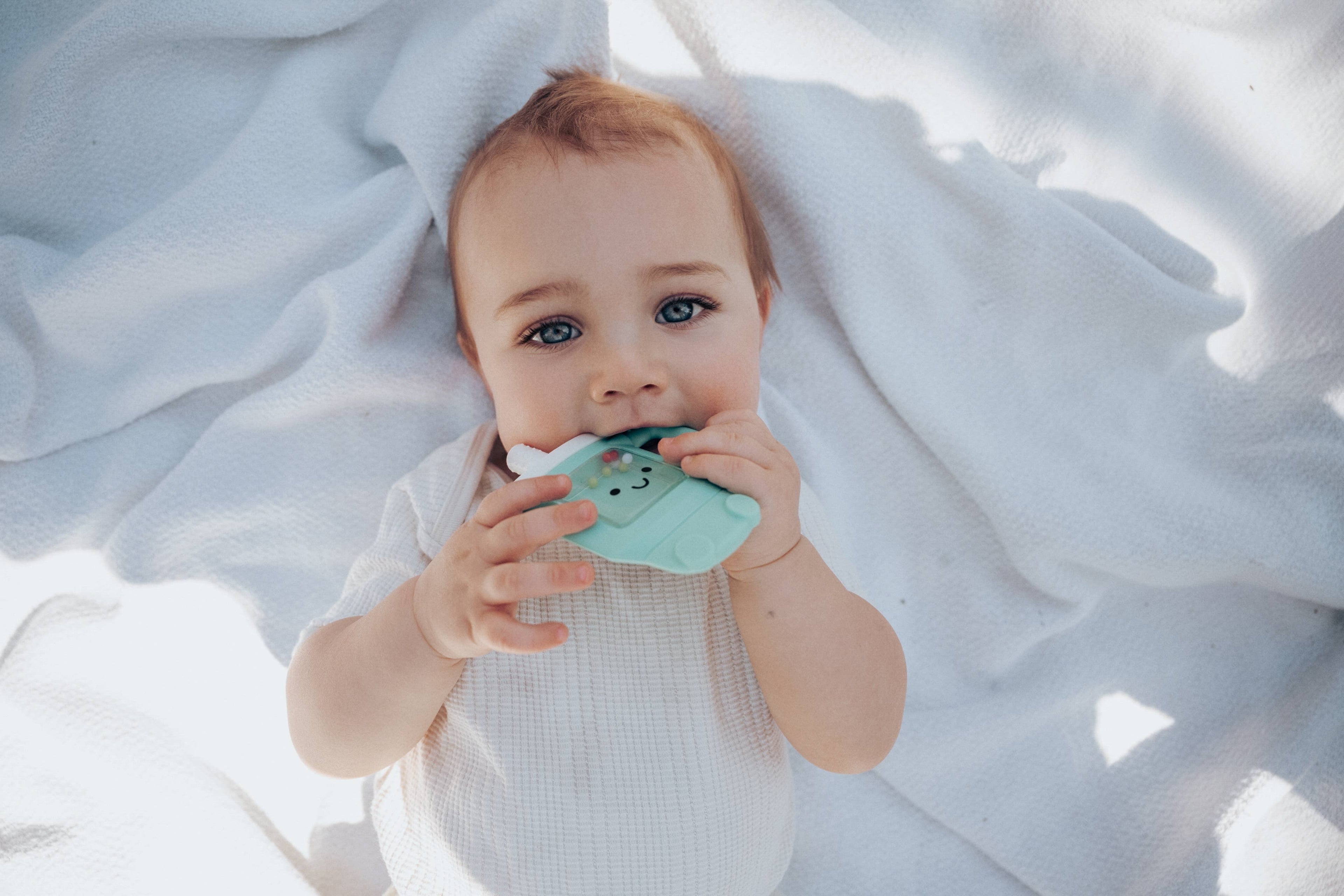 Sweetie Shake Plus™ - Teething + Rattle Toy - Tumbler, Croissant, or Sushi
