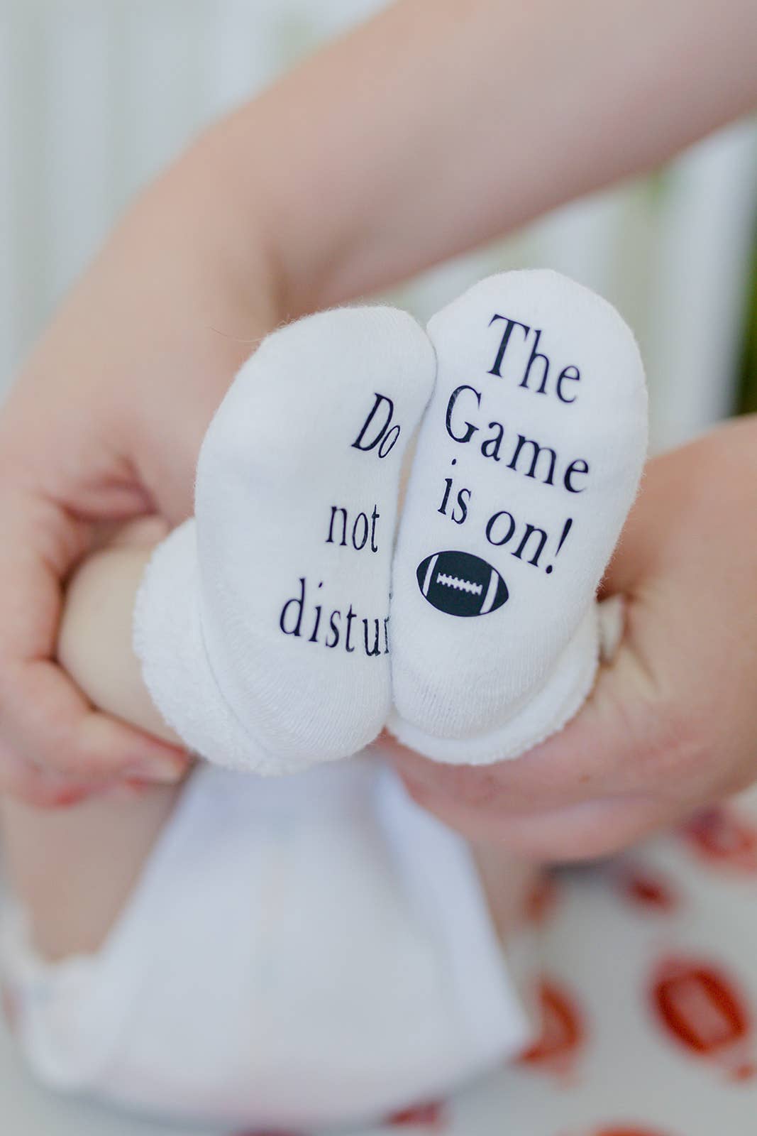 Do Not Disturb The Game is on Football Baby Socks | Sports