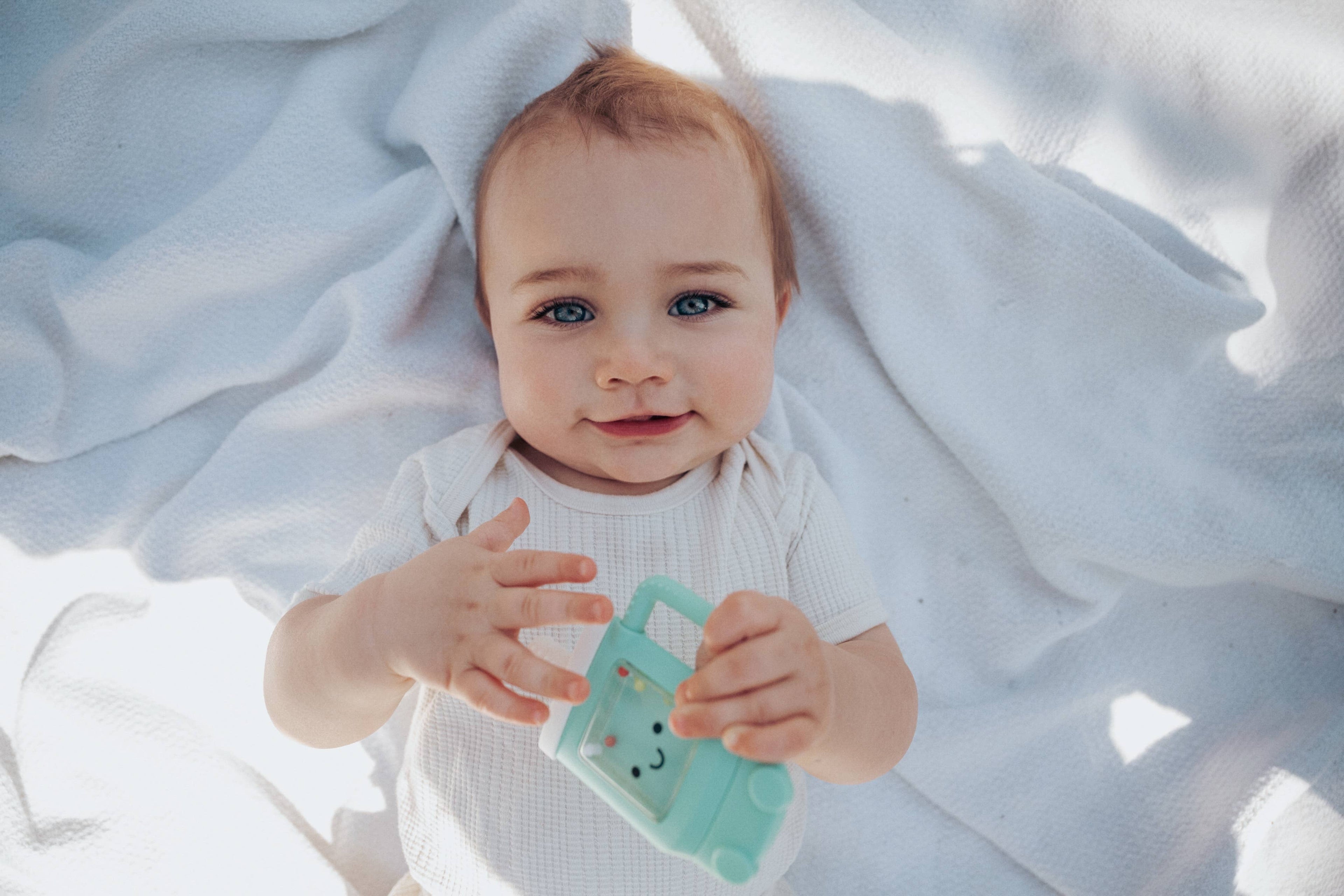 Sweetie Shake Plus™ - Teething + Rattle Toy - Tumbler, Croissant, or Sushi